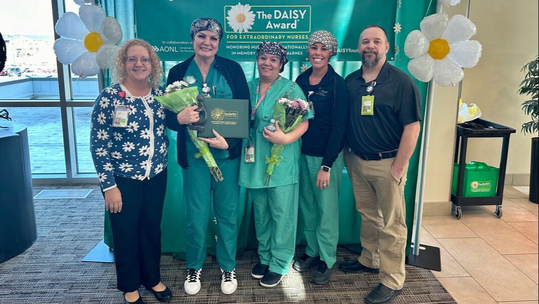 Pictured left to right: Lorri Katterhagen, CNO; Wendy Morby, RN & DAISY Award® Recipient and Trios Staff.